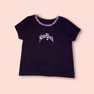 Black New York top from brandy Melville, brand new never worn.